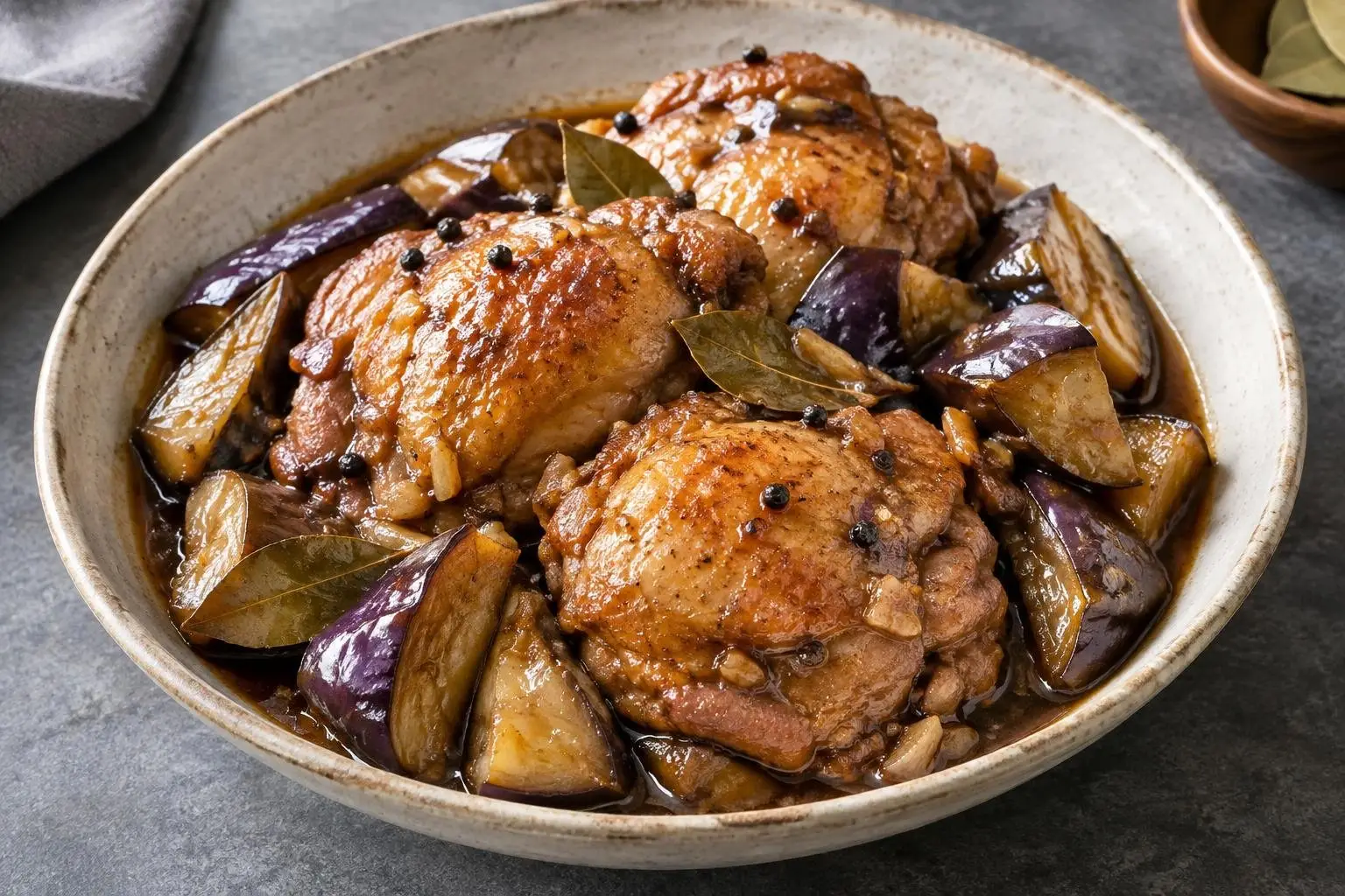 Chicken Adobo Braise with Seasonal Eggplant plated and ready to serve