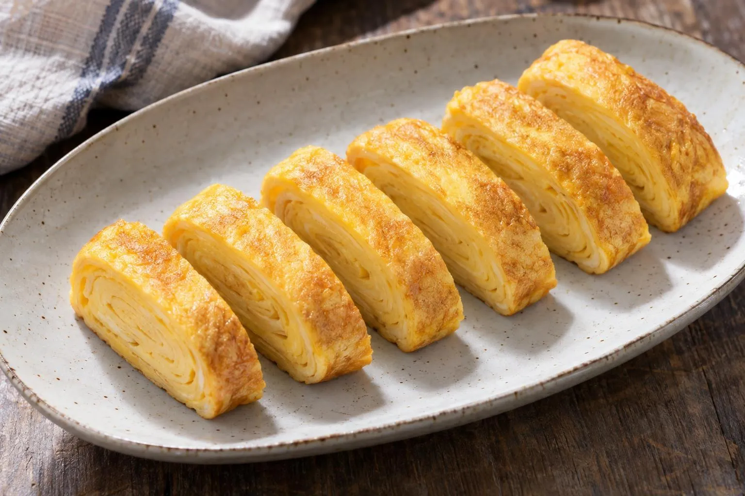 Tamagoyaki in a Round Pan plated and ready to serve